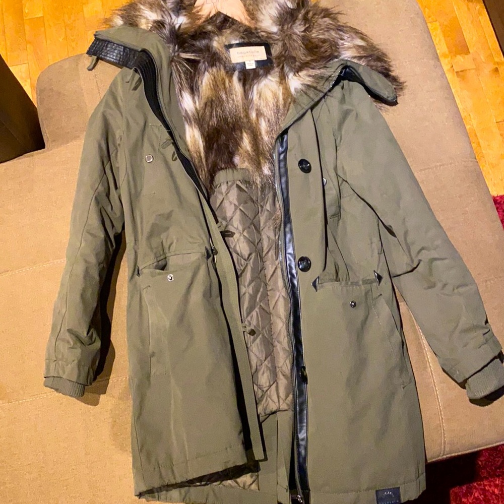 Coat with faux fur lining